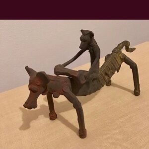 Iron Sculpture of a Caracter on a Horse